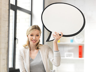 Image showing smiling businesswoman with blank text bubble