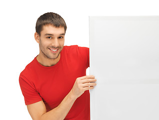 Image showing handsome man with big blank board