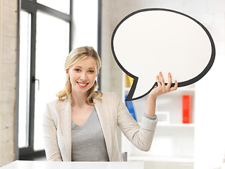 Image showing smiling businesswoman with blank text bubble