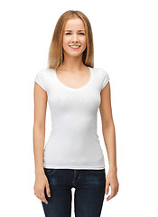 Image showing smiling teenage girl in blank white t-shirt