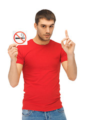 Image showing man in red shirt with no smoking sign
