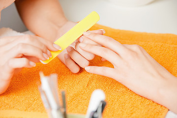 Image showing manicure process on female hands