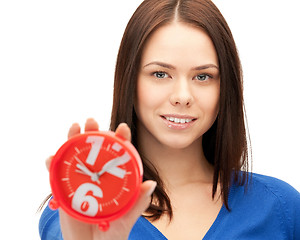 Image showing woman holding alarm clock