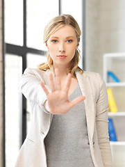 Image showing young woman making stop gesture