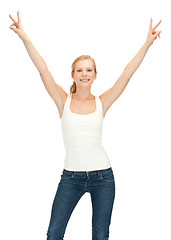 Image showing girl in blank white t-shirt showing victory sign