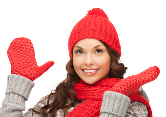 Image showing beautiful woman in hat, muffler and mittens