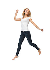 Image showing jumping teenage girl in blank white t-shirt