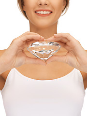 Image showing smiling woman with big diamond