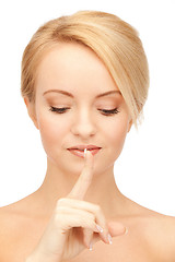 Image showing woman with finger on lips