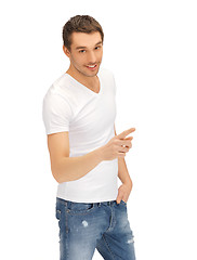 Image showing man in white shirt pointing his finger