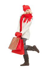 Image showing young girl with shopping bags