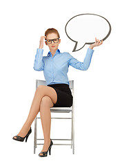 Image showing pensive businesswoman with blank text bubble