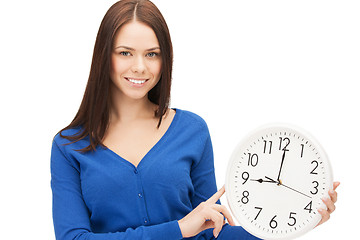 Image showing woman holding big clock