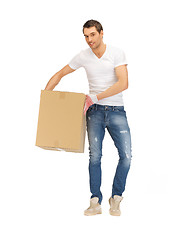 Image showing handsome man with big box