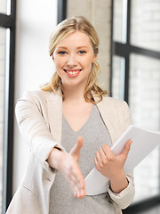 Image showing woman with an open hand ready for handshake