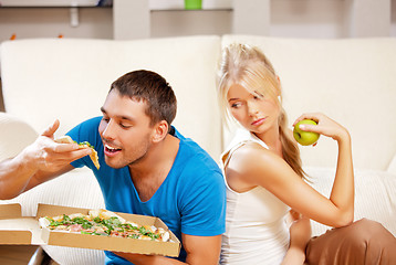 Image showing couple eating different food