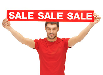 Image showing handsome man with sale sign