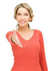 Image showing woman with an open hand ready for handshake