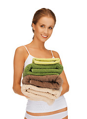 Image showing lovely woman with towels