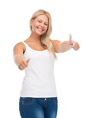 Image showing teenage girl in blank white t-shirt with thumbs up