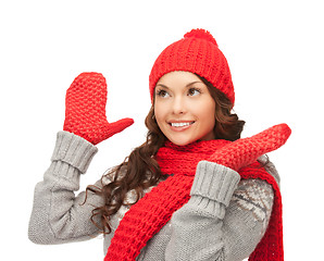 Image showing beautiful woman in hat, muffler and mittens