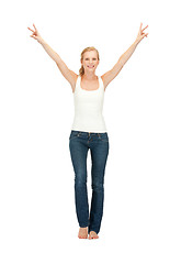 Image showing girl in blank white t-shirt showing victory sign