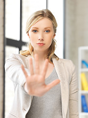 Image showing young woman making stop gesture