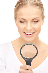 Image showing woman with magnifying glass