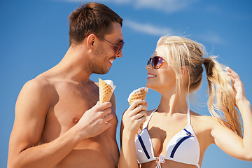 Image showing happy couple with ice cream