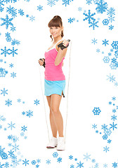 Image showing fitness instructor with jump rope