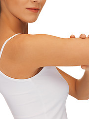 Image showing sporty woman flexing her biceps