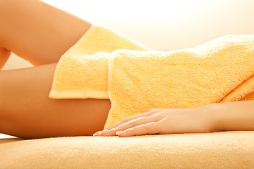 Image showing female hands and legs in spa salon