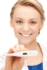 Image showing female doctor with thermometer