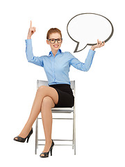 Image showing smiling businesswoman with blank text bubble