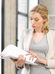 Image showing calm woman with documents