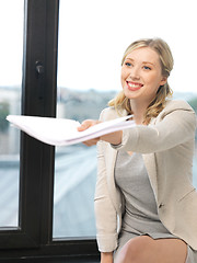Image showing happy woman with documents