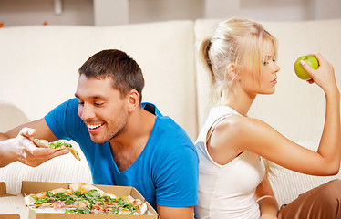 Image showing couple eating different food