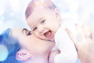 Image showing happy mother with baby in hands