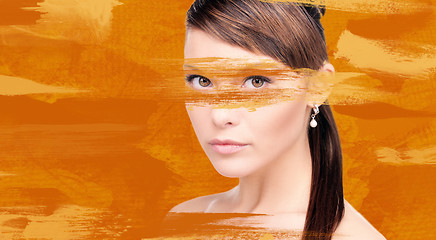 Image showing woman with orange paint