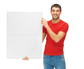 Image showing handsome man with big blank board