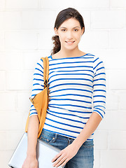 Image showing happy and smiling teenage girl with laptop