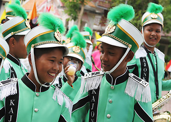 Image showing Thai marching band members in traditional dress during in a para