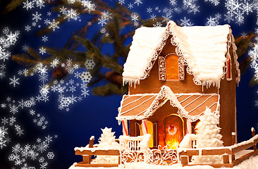 Image showing gingerbread house over christmas background