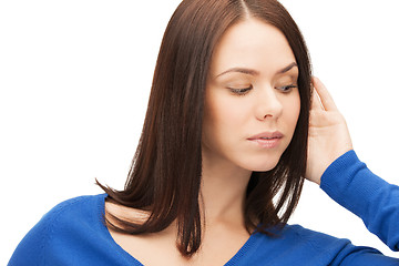 Image showing serious woman listening gossip