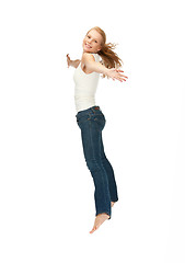 Image showing jumping teenage girl in blank white t-shirt