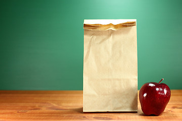 Image showing School Lunch Sack Sitting on Teacher Desk