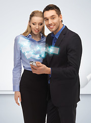 Image showing man and woman with smartphone