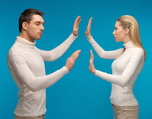 Image showing man and woman working with something imaginary