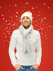 Image showing handsome man in warm sweater, hat and scarf