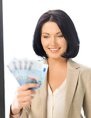 Image showing lovely woman with euro cash money